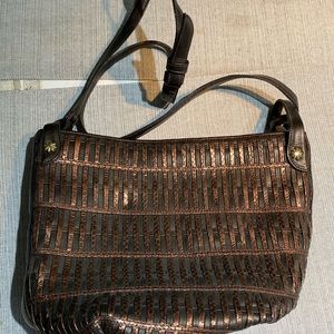 Never used brown/black purse. Made by Sharif